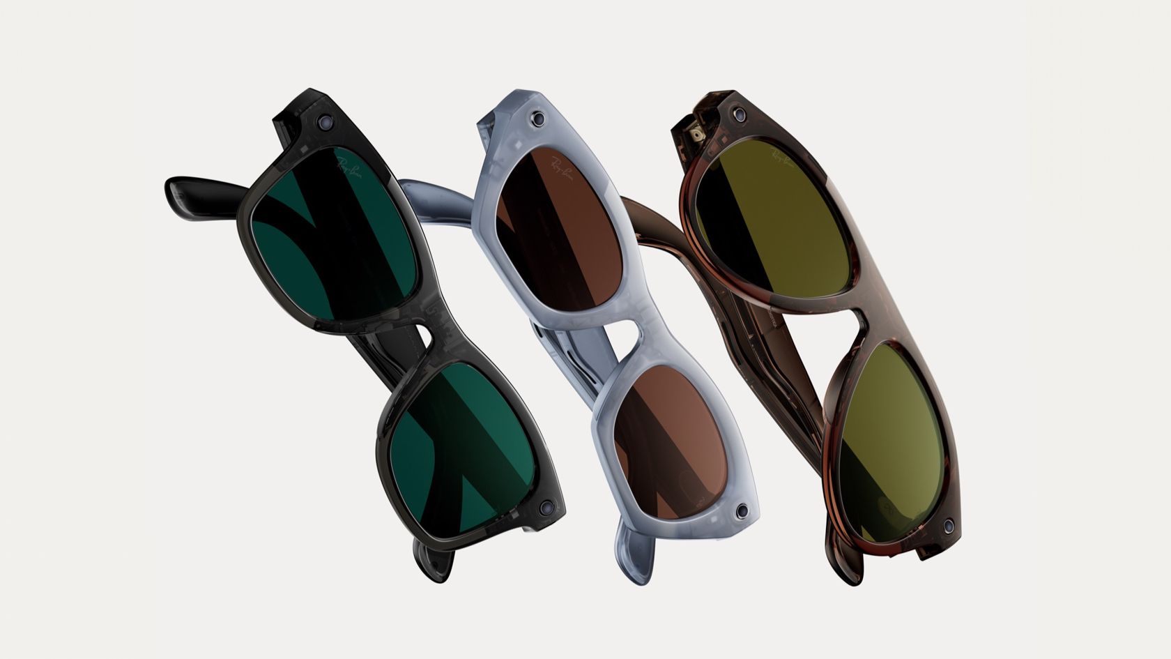 Três óculos Ray-Ban Meta em diferentes cores e armações